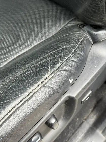 Car seat leather crack before repair