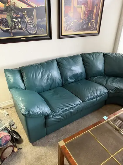 Leather couch after pet scratch and seam repair in Denver