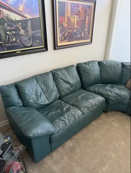 Pet scratches and seam damage on leather couch before repair in Denver